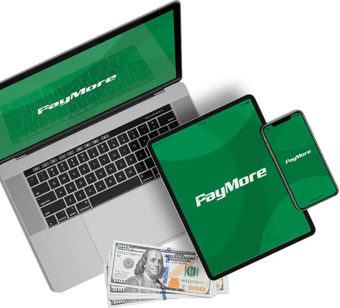 a macbook ipad and iPhone with cash next to it